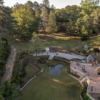 A bird 's eye view of the pond and water features.